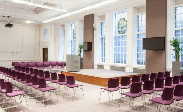Cowdray Hall setup for a conference event with u-shaped seating