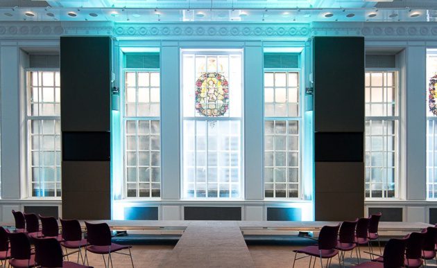 Natural light floods in through the stained glass windows of Cowdray Hall